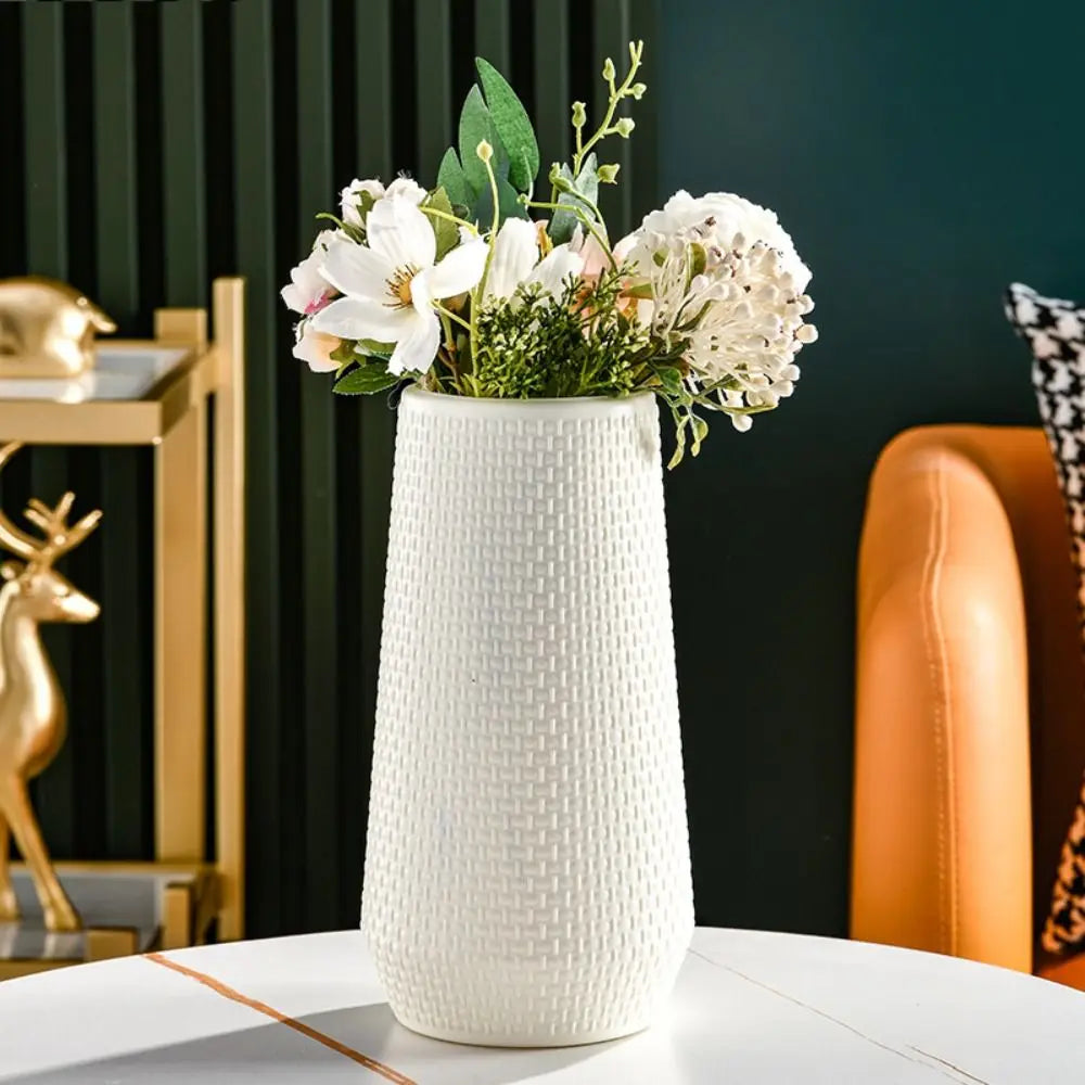 Cache-pot orange avec plante verte