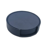 Sous-verres ronds en plastique noir, empilables et réutilisables pour protéger les surfaces des tables.