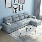 canapé d'angle moderne tissu uni vert pastel gris clair rose pâle jaune scandinave salon