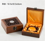 boîtes bois marron foncé boîte bijoux décoration intérieure boutons métalliques ajourés respectueux environnement classique