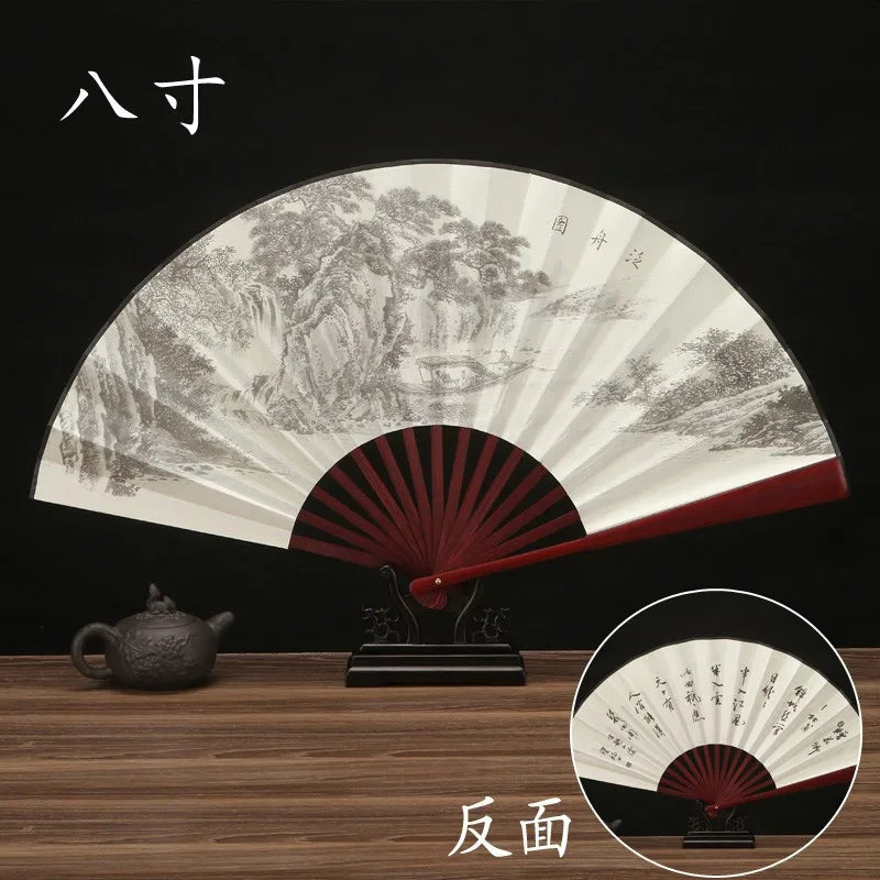 éventail traditionnel artisanal peinture paysage calligraphie nervures bambou tissu beige brun fixations métal 27x48cm