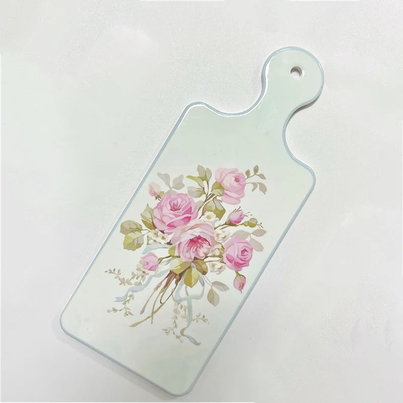 planche découper céramique vintage fleurs roses motifs géométriques blanc roseclair