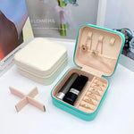 boîte rangement bijoux simili cuir rose clair moderne réutilisable boucles oreilles colliers bagues bracelet