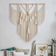 décoration murale macramé tissée main beige crème franges pompons bohème ethniqueSuspension cordes bois
