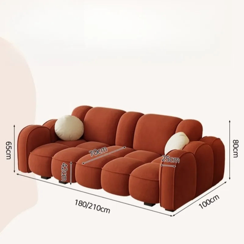 canapé d'angle moderne orange vert clair beige coussins contemporain minimaliste scandinave