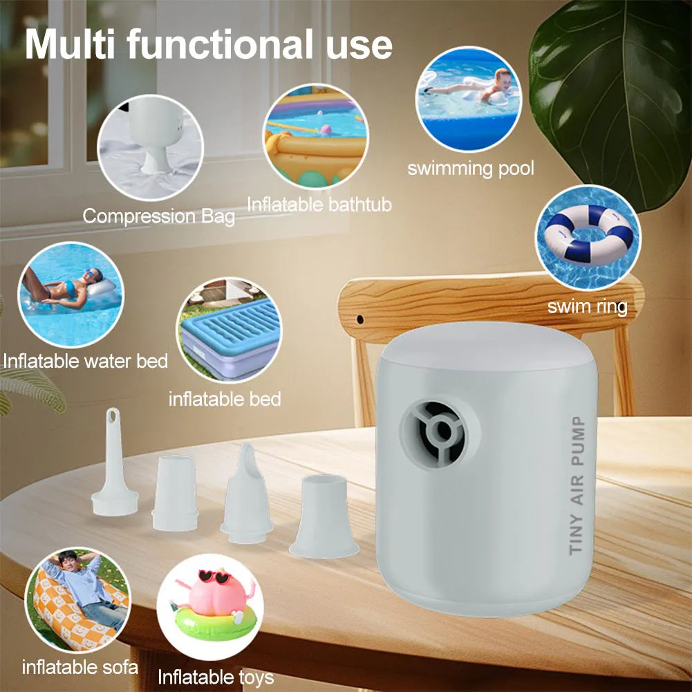 gonfleur air portable blanc noir moderne compact poignée embouts multiples cable usb