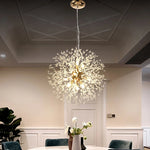lustre suspension moderne cristal transparent doré luminaire salon restaurant élégant contemporain
