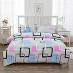 Housse de couette motif géométrique 140x190 cm sur un lit moderne