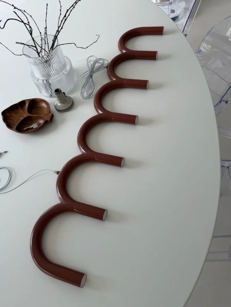 suspension lumineuse contemporaine bleu marron noir forme circulaire lisse led fixée câbles
