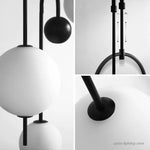suspension lumineuse moderne sphères translucides structure métallique noir blanc