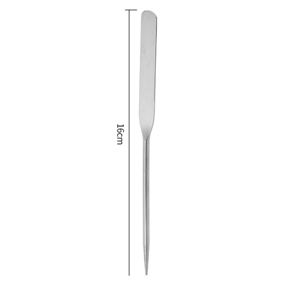 spatule maquillage acier inoxydable argenté moderne lisse brillante outils cosmétiques minimaliste qualité professionnelle durable