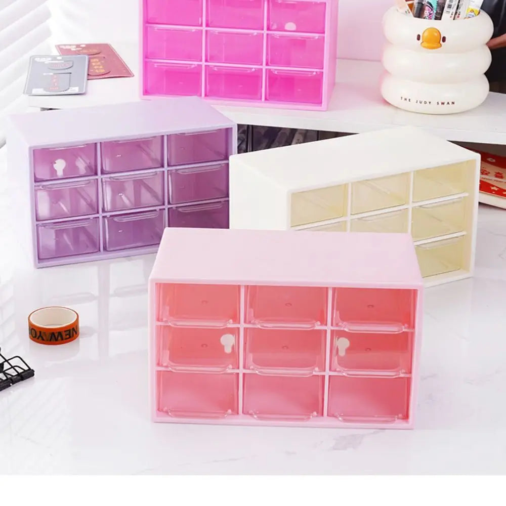 boîtes compartiments transparentes rose violet blanche modernes pratiques clips autocollants pince linge empilables garage