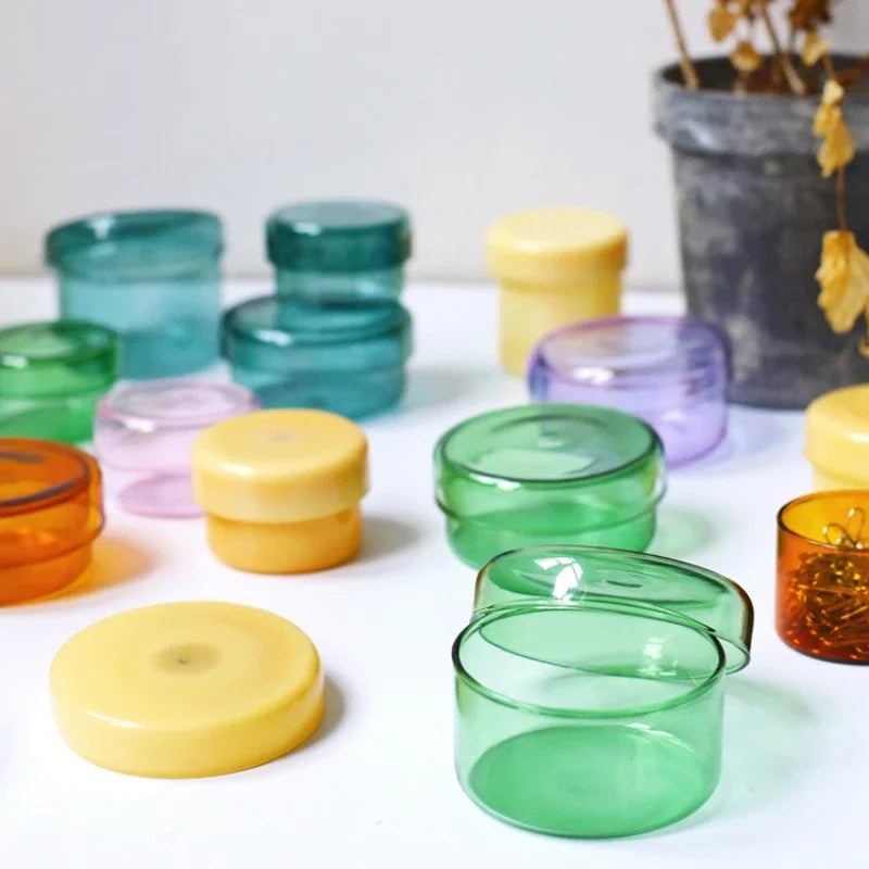 boîtes rangement verre transparentes modernes couleurs vert orange jaune rose clips papier respectueux environnement