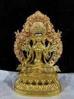 statue bouddhiste or bleu rouge turquoise décoration florale tibétain multiple bras base lotus