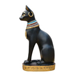 statuette égyptienne ancienne chat ornements hiéroglyphes noir blanc doré