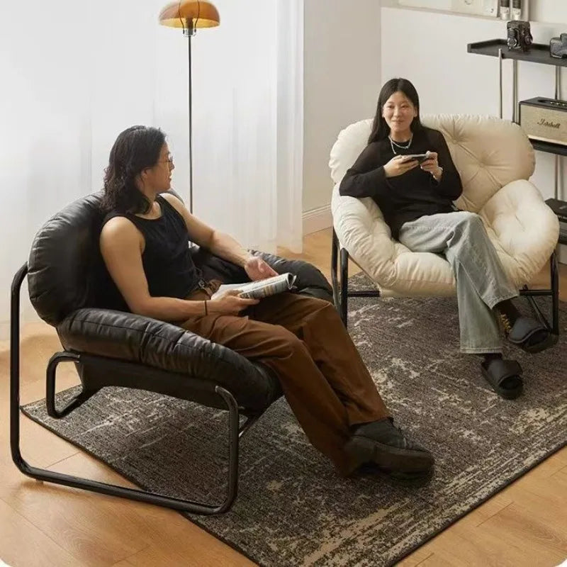 fauteuil cuir moderne noir salon décontracté intérieur chaise relaxation maison contemporaine