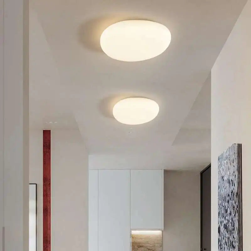 plafonnier led moderne minimaliste acrylique blanc fixation circulaire ovale éclairage quotidien contemporain