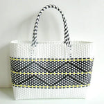 sac main plastique tissé géométrique polyvalent femme moderne noir blanc jaune bleu turquoise poches