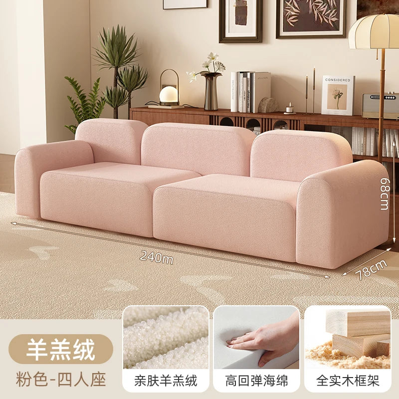 canapé moderne rose clair uni bois salon minimaliste 210cm 170cm 240cm coussins
