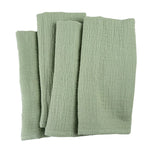 Pile de serviettes en coton de couleur vert sauge.