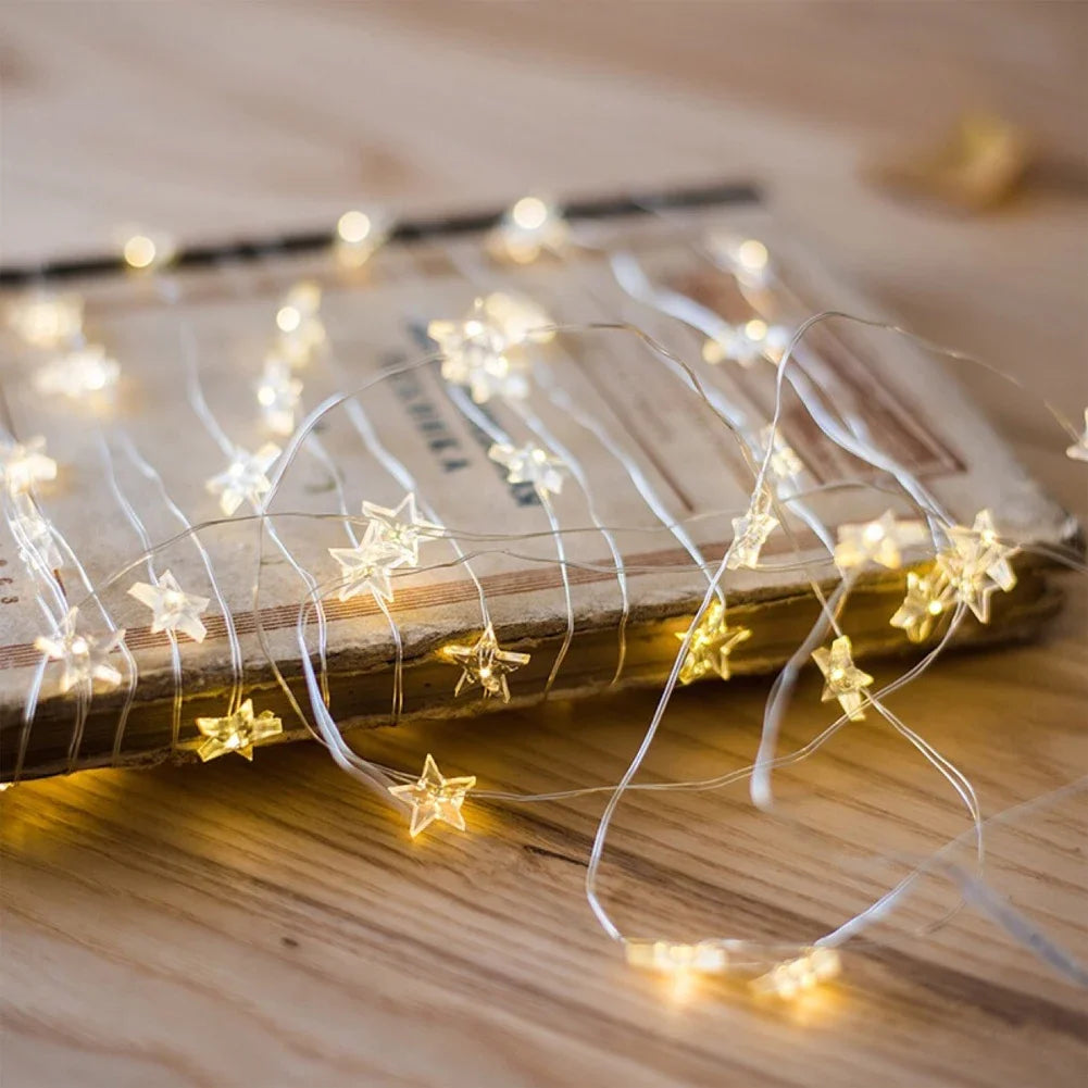 guirlande lumineuse étoiles dorées moderne décoration noël blanc led 5m 50lumières batteries incluses