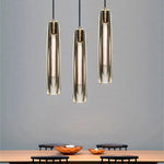 luminaire suspendu moderne verre transparent or métal cuivre chambre étude minimaliste