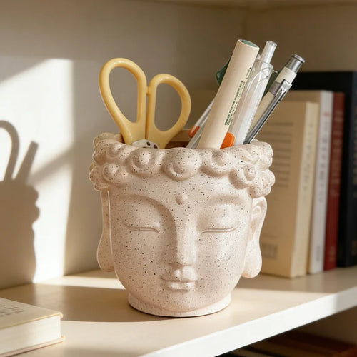 pot crayons tête bouddha beige clair texture sculptée moderne décoratif bureaustylos ciseaux