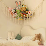 hamac suspendu filet franges boho moderne peluches rose blanc gris bleu violet respectueux environnement