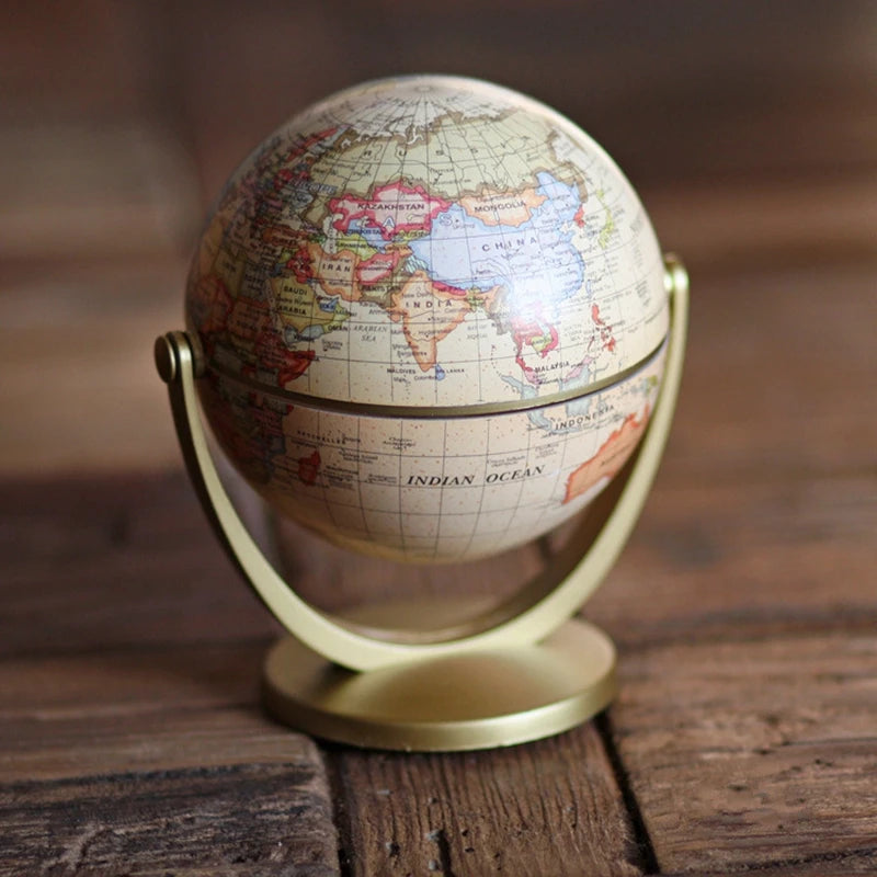 globe terrestre vintage cartographie détaillée bleu beige doré support rotatif métal