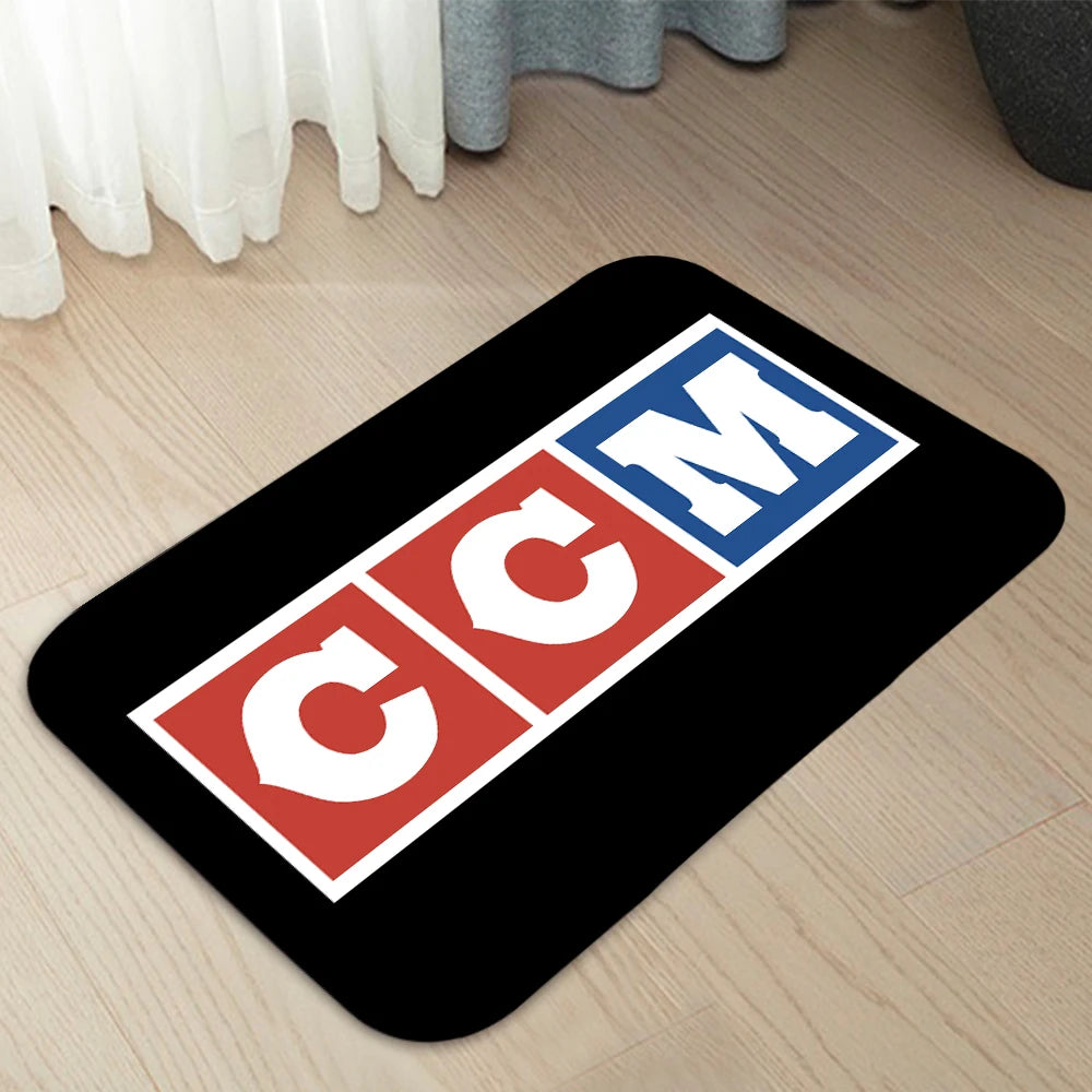tapis moderne graphique ccm logo noir rouge blanc bleu jaune salon