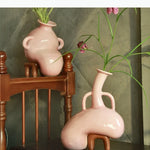 vase décoratif moderne rose marron nuance sculptural asymétrique fixations pied
