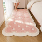 tapis moderne rose clair blanc motifs coeurs noeuds rayures bordure ondulée salon chambre enfant