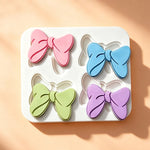 moule silicone nœuds papillons pâtisserie décorative couleurs variées fondant cupcakes