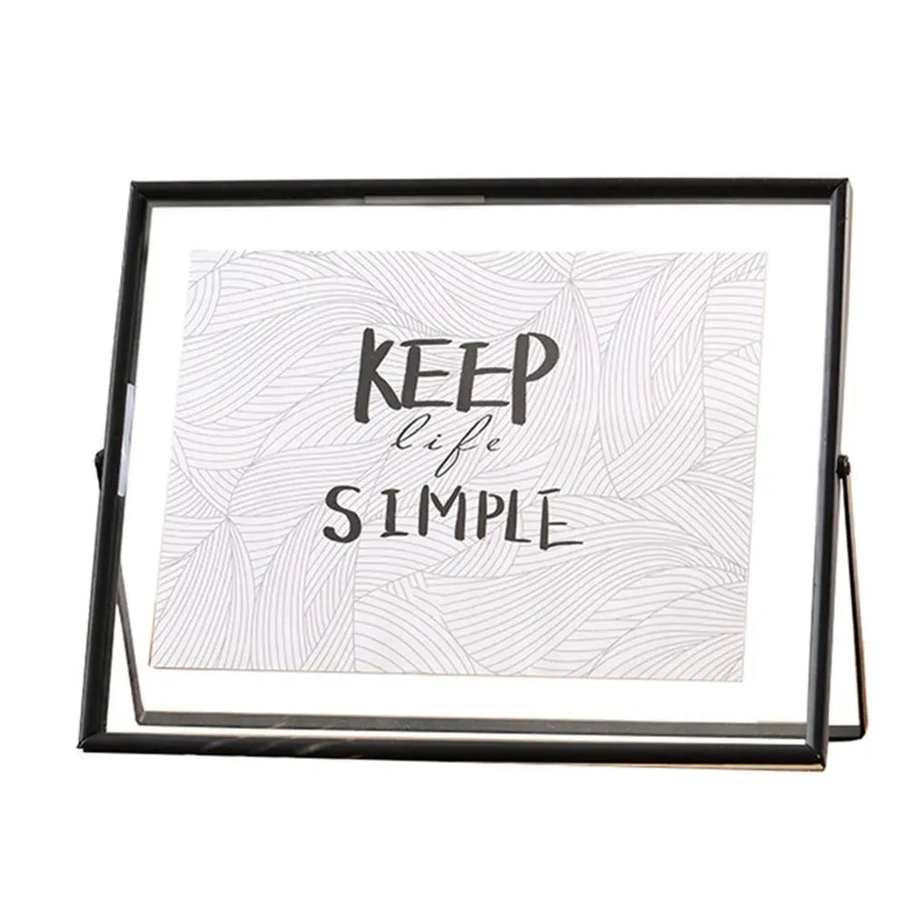 cadre photo moderne minimaliste or noir pieds triangulaires texte simple verre