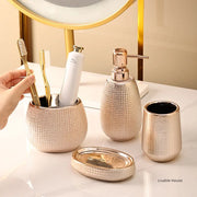 Ensemble accessoire salle de bain céramique or rose - Porte-brosse à dents, tasse et distributeur savon élégant