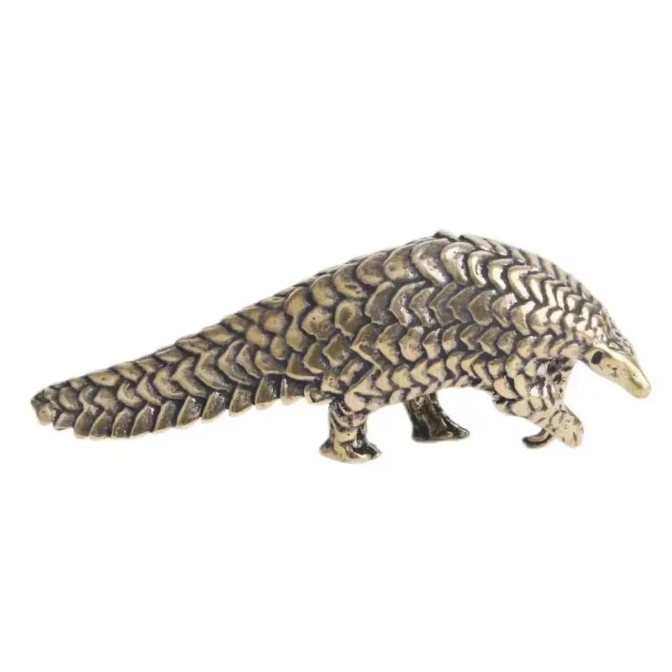 ornement métallique statuette pangolin doré émaillé écailles animalier décoration maison