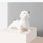 figurine chien bouledogue français noir blanc détails dorés lisse brillante moderne décorative