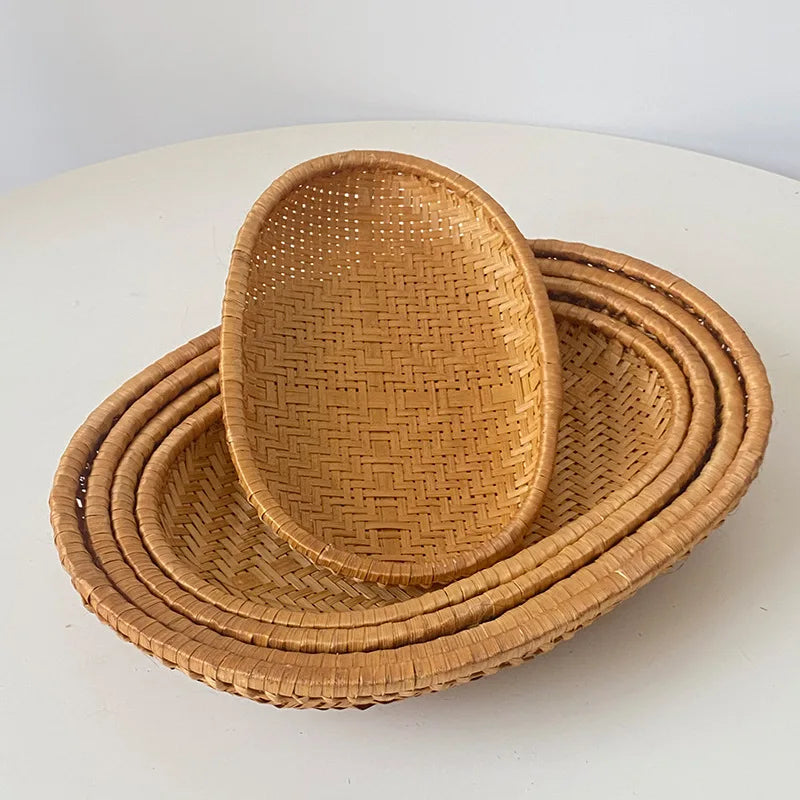 panier oval rotin tressé main marron clair texture traditionnelle rustique organisation fruits légumes