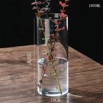 vases verre modernes transparents décoration florale table mariage