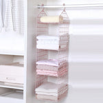 étagère suspendue moderne rose pâle étages hooks rangement serviettes pulls
