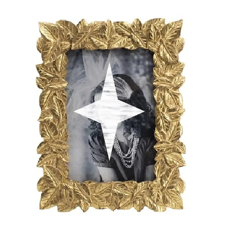 cadre photo or feuilles sculptées vintage opalescent fixation papillon métal doré