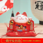 statue chat porte bonheur traditionnel chinois blanc jaune bleu symboles papillons caractères chinois