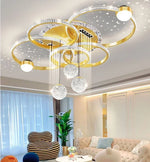 lampe suspendue moderne noire dorée blanche strass étoiles led chambre restaurant villa