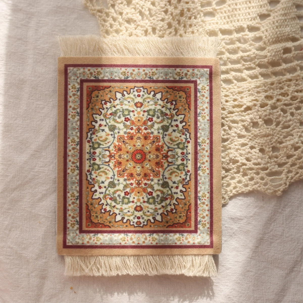 tapis table classique ornements floraux motifs géométriques franges rouge vert bleu beige blanc respectueux