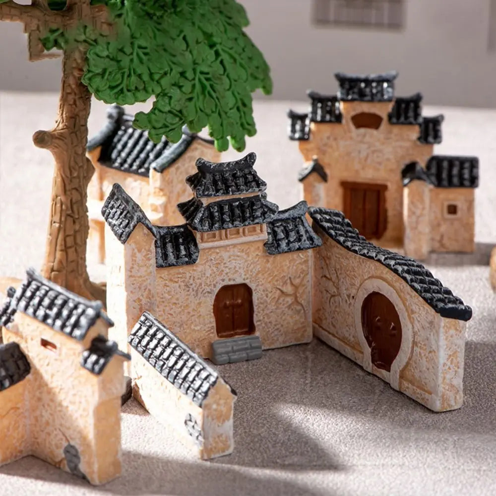 miniature village traditionnel résine beige gris brun foncé toitures tuiles statues lions chinois decoration