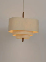 suspension lumineuse tissu beige clair moderne salon lumière led fer chaîne métallique