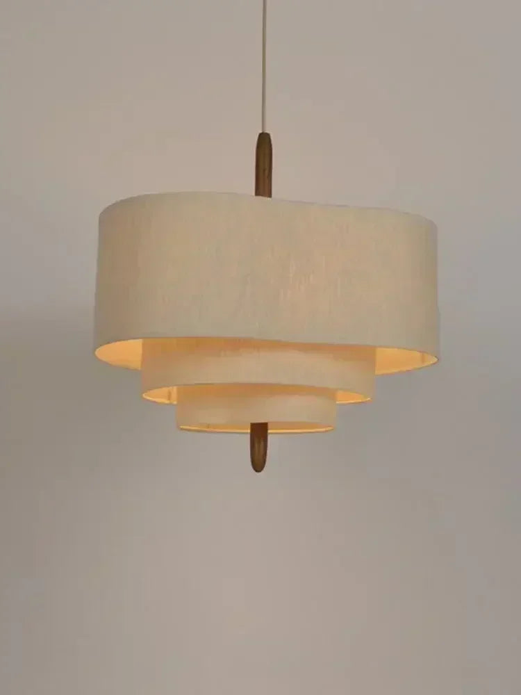 suspension lumineuse tissu beige clair moderne salon lumière led fer chaîne métallique