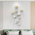 décoration murale boules rondes brillantes blanc doré argenté moderne élégante suspension intérieure