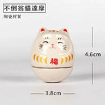 statue daruma gris relief sculpté artisanal traditionnel maison décoration bouddhiste