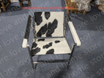 chaise salon moderne minimaliste cuir métal chromé accoudoirs marron noir beige